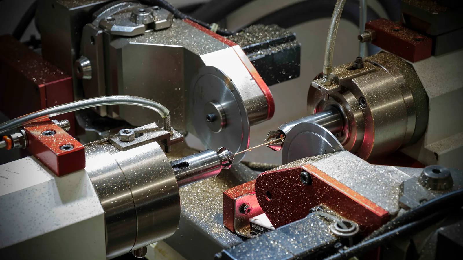 Gold strip being processed on a rolling mill at Mioro’s production facility